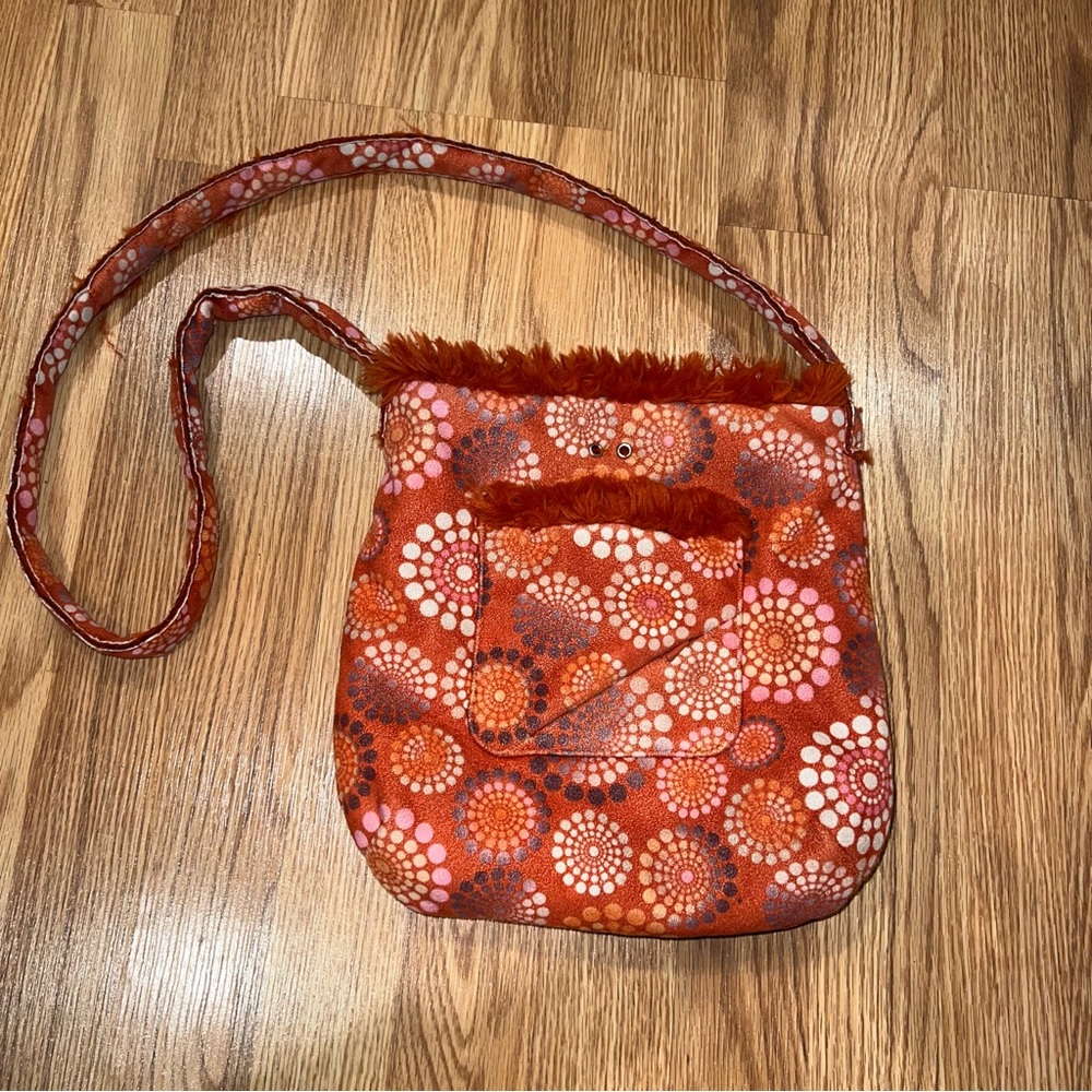 Athleta Orange faux fur printed Ultra-suede shoulder bag‎